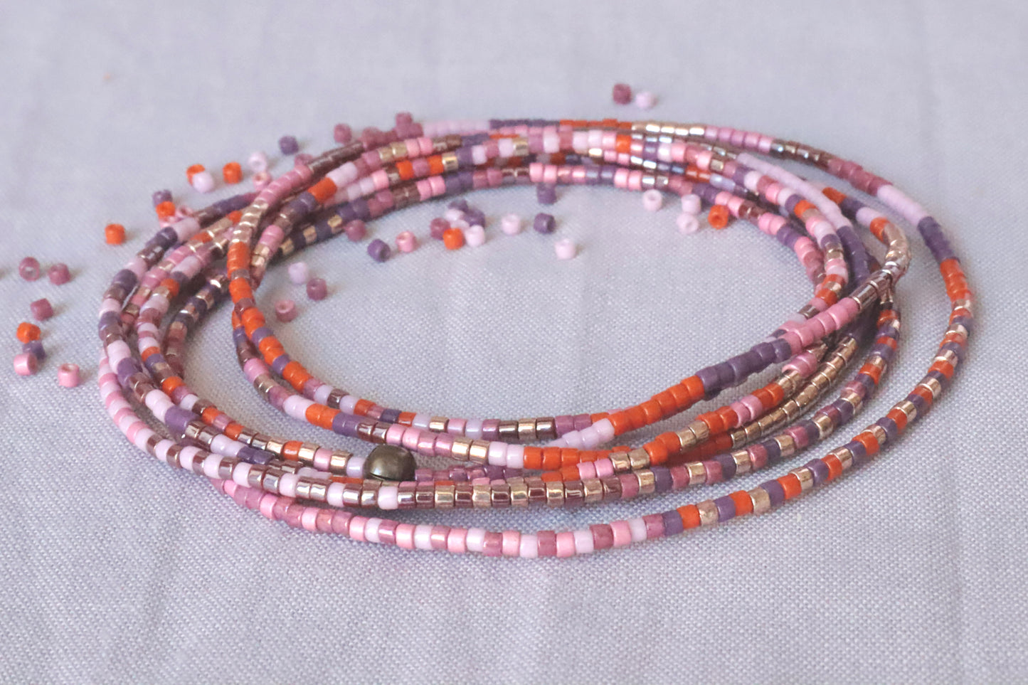 bracelet élastique rose et orange