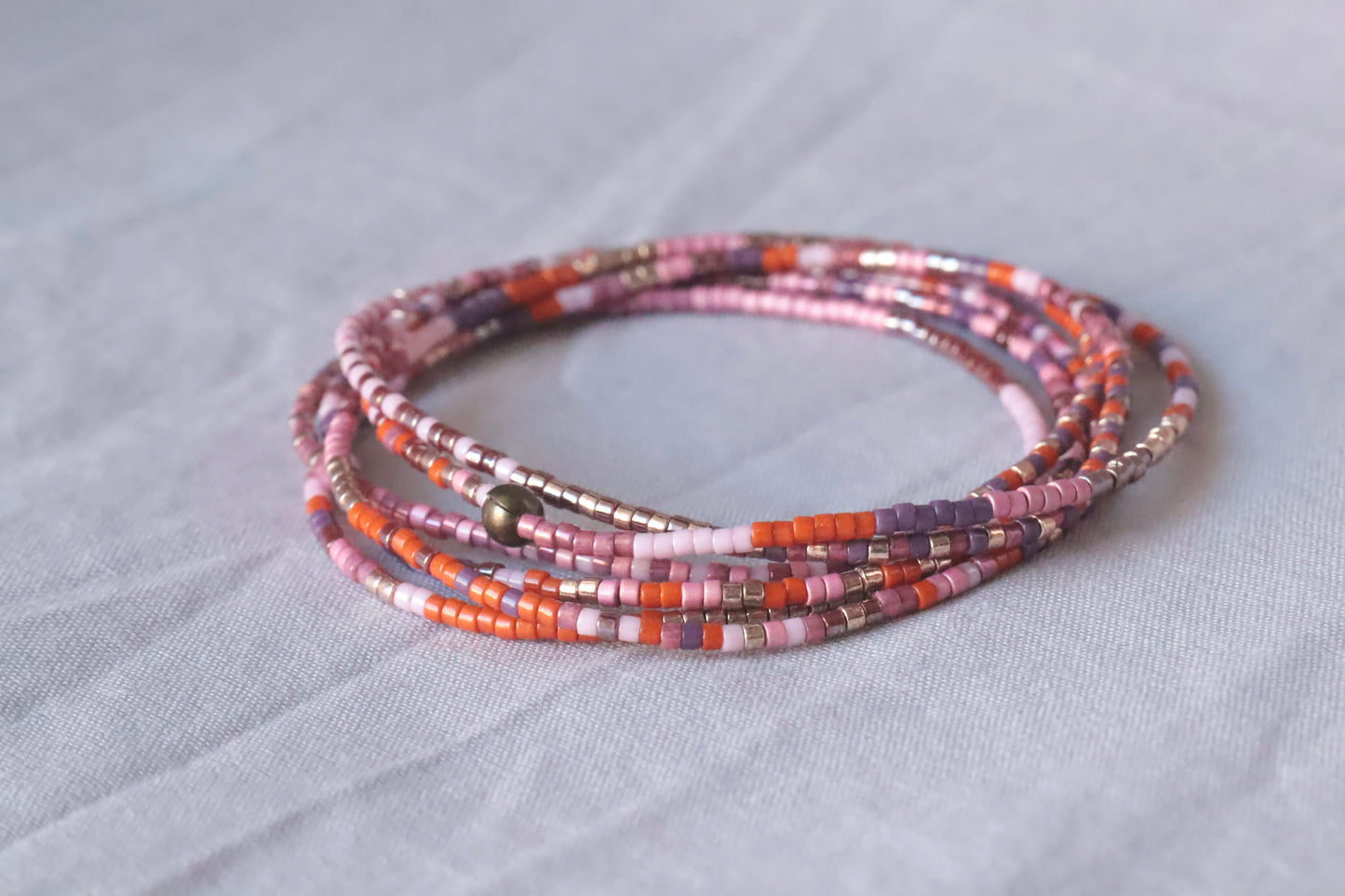 bracelet élastique rose et orange